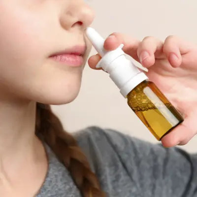 Utilisation d'un spray pour le nez