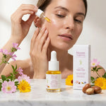 Aube d'été soin jour fluide facial doré avec fleurs botaniques sur marbre blanc