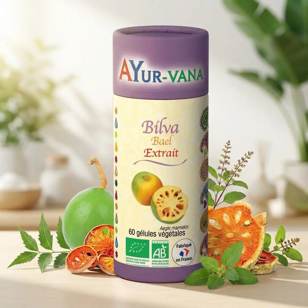Gélules Bael Bilva Bio Ayur-Vana avec fruits frais et herbes en packaging purple crème