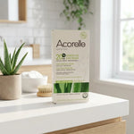 Bandes de cire froide Acorelle pour le visage sur vanité spa avec plante aloe vera