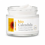 Pot de crème visage Bio Calendula Dr.Theiss avec pompe dorée sur fond blanc