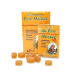 Bonbons du Père Michel Bioligo boîtes et bonbons sur fond blanc, emballage traditionnel orange et vert