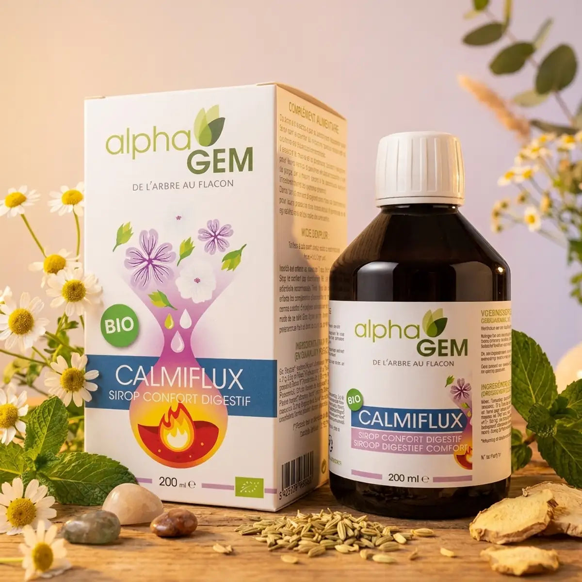 Calmiflux bio bouteille 200ml Alphagem avec herbes et fleurs de camomille sur fond wellness