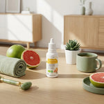 CitroBiotic liquide bio Sanitas avec pamplemousse frais sur table wellness minimaliste