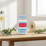 Flacon de citrulline en gélules Code Laboratoire sur espace wellness avec tapis yoga et feuilles vertes