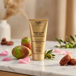 Crème raffermissante bio Najel dans son tube doré, entourée de fruits et ingrédients naturels