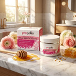 Crème revitalisante Gelée Royale Pollen Q10 Propolia en pot sur marbre avec fleurs
