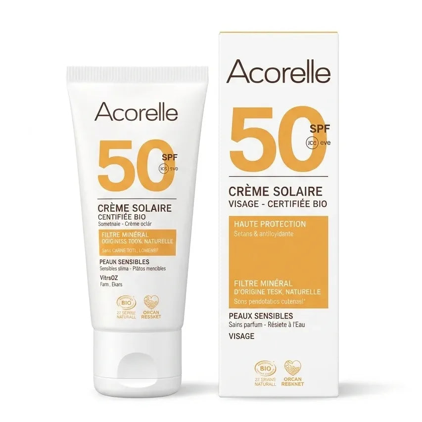 Crème solaire visage SPF50 bio Acorelle en tube et boîte sur fond blanc