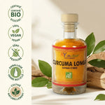 Curcuma Longa Bio Ayurvana en bouteille verre avec certifications vegan et écocert sur fond naturel