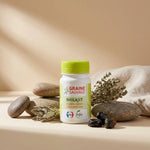 Gélules Shilajit vegan Graine Sauvage avec flacon vert lime entouré d'éléments naturels