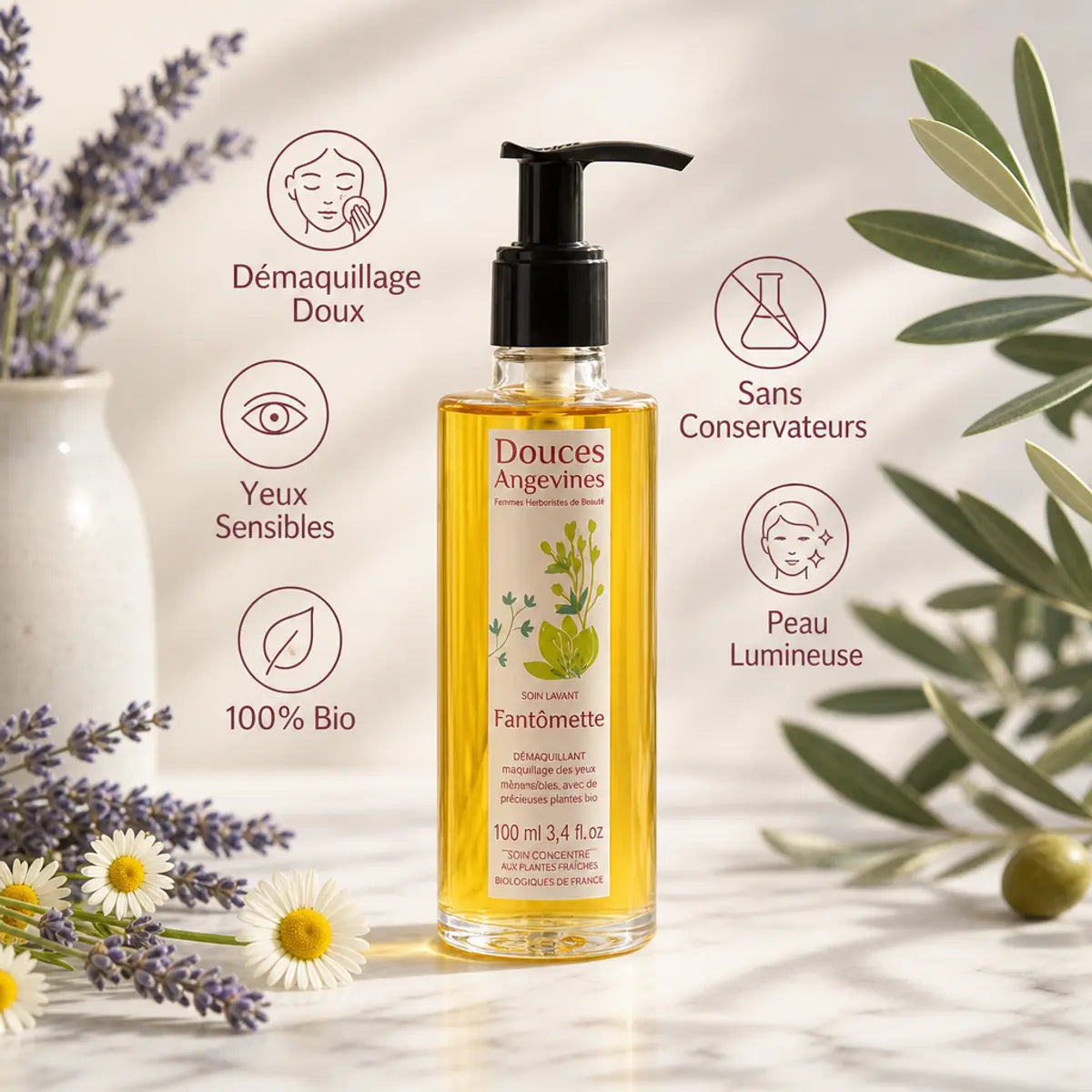Fantômette huile démaquillante bio avec fleurs de lavande, chamomille et olive sur marbre blanc