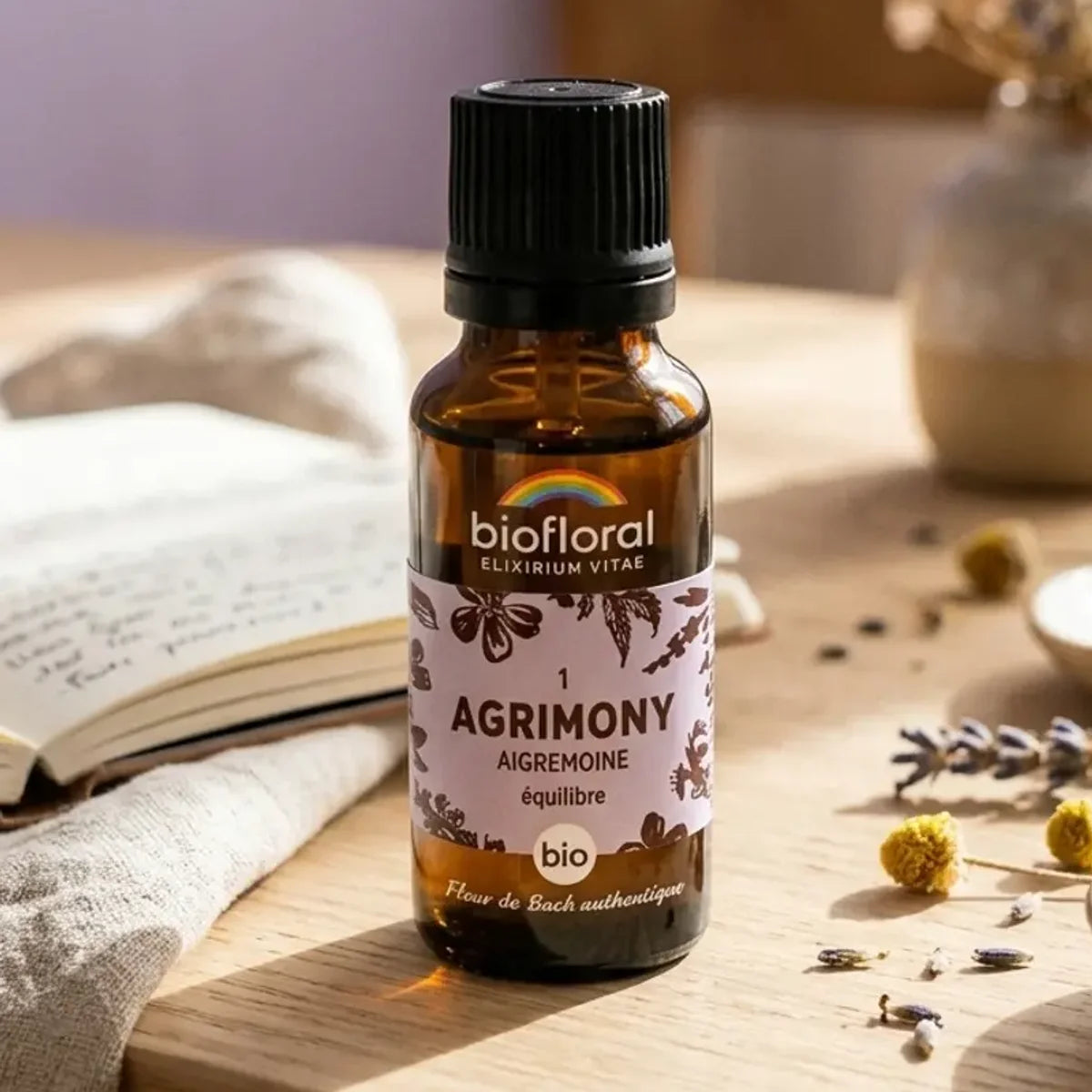 Fleur de Bach Agrimony Bio granules Biofloral bouteille verre ambré sur espace wellness serein