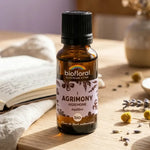 Fleur de Bach Agrimony Bio granules Biofloral bouteille verre ambré sur espace wellness serein