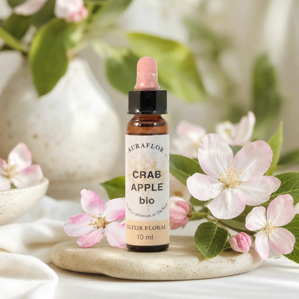 Fleurs de Bach Pommier Sauvage bio en flacon compte-gouttes avec fleurs roses et feuilles vertes