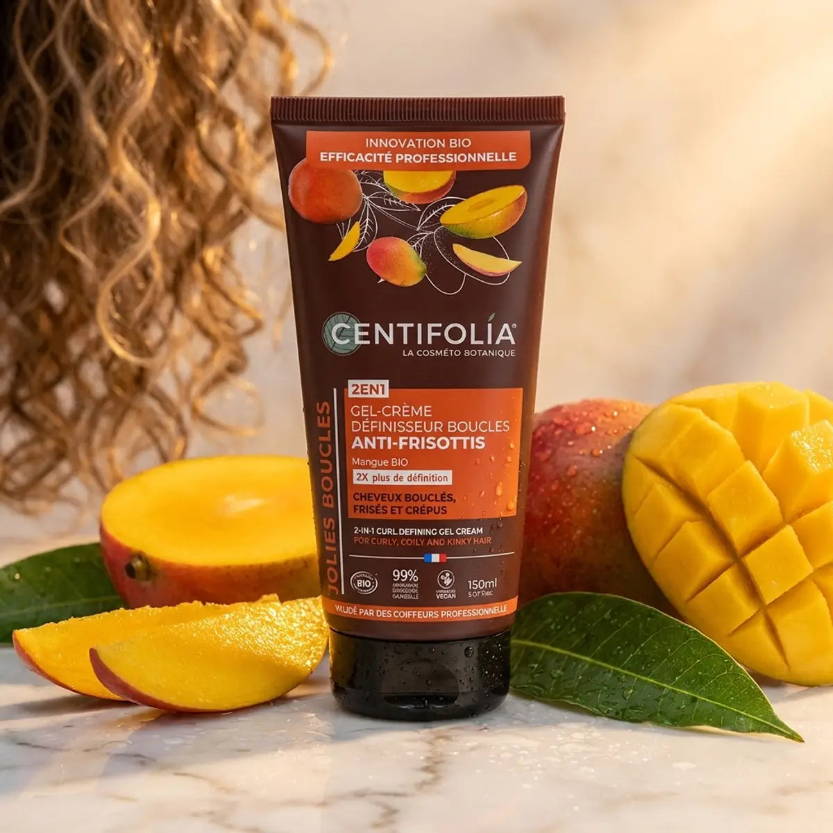 Gel Crème Définisseur Boucles Centifolia 2en1 avec mangue et fruits botaniques sur marbre