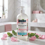 Gel intime fraîcheur bio Coslys rose eucalyptus sur marbre avec pétales et feuilles naturelles
