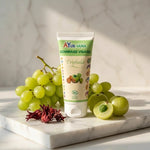 Gommage Visage Triphala Bio Ayurvana sur marbre avec fruits ayurvédiques