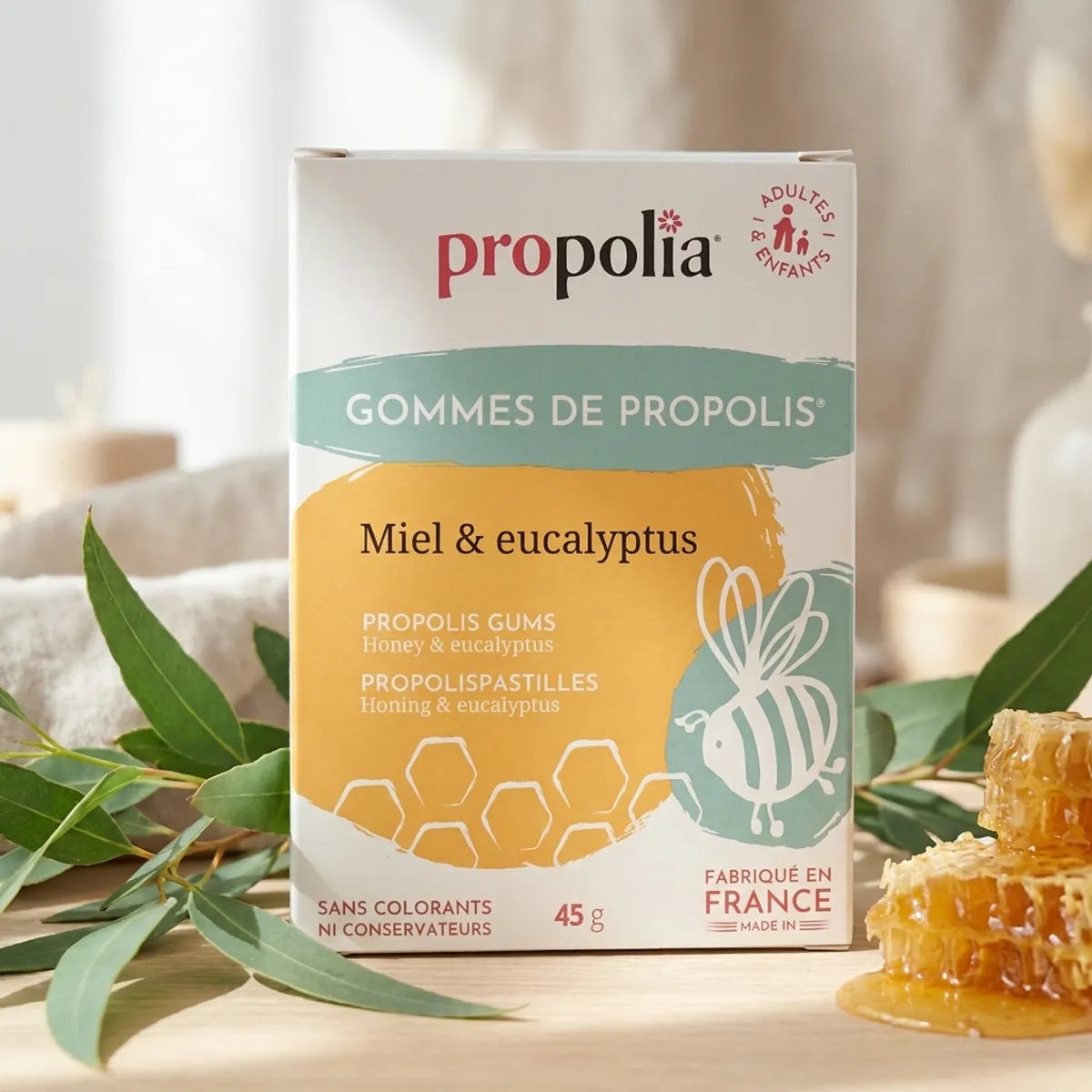 Gommes Propolia miel eucalyptus avec branches fraiches et rayon miel naturel
