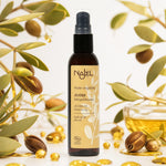 Huile de Jojoba Najel bio avec branches et graines de jojoba sur fond blanc
