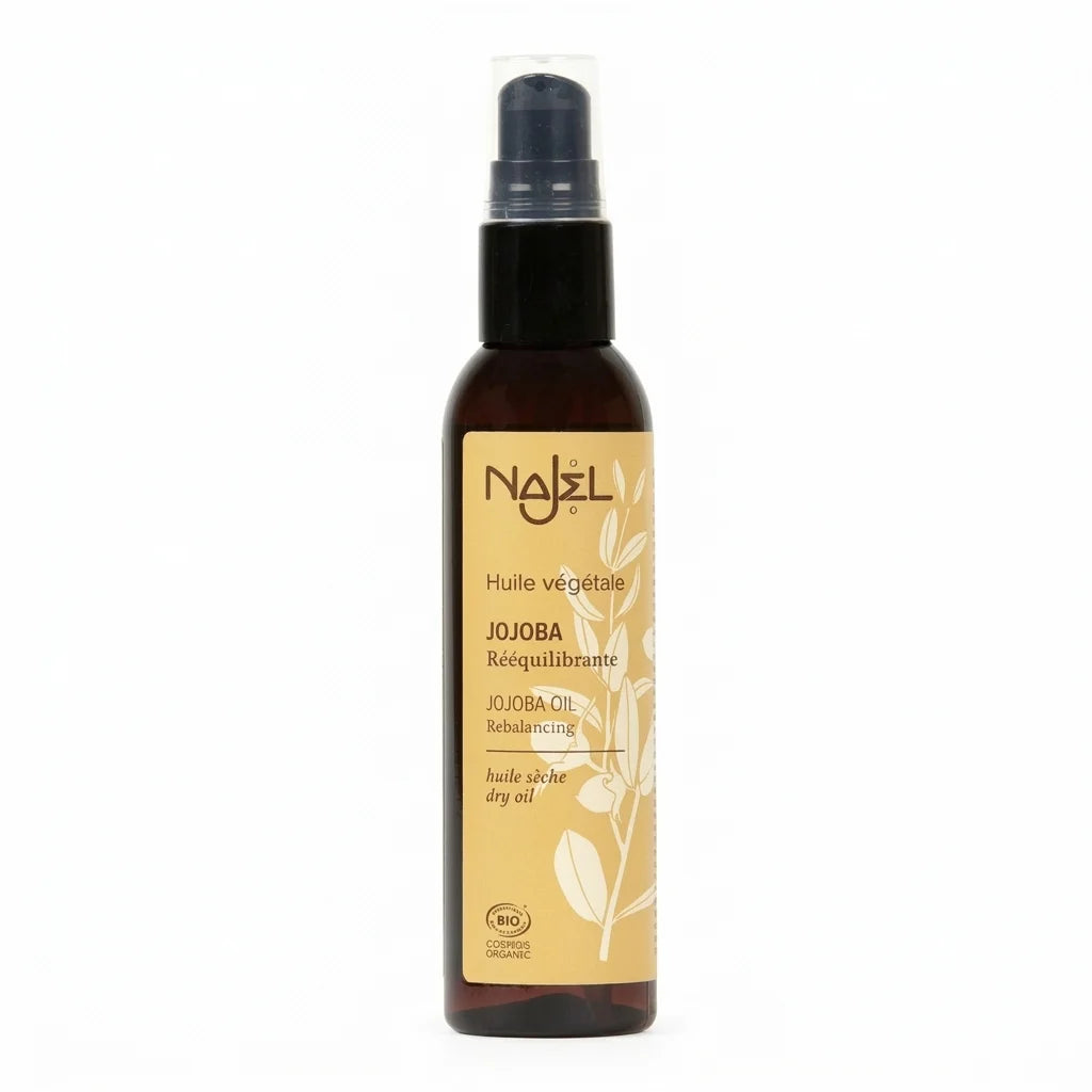 Flacon d'huile de Jojoba certifiée bio Najel sur fond blanc, produit de beauté naturel