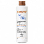 Huile nettoyante visage bio Florame en flacon avec bouchon bronze sur fond blanc