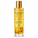 Huile sèche bio Infusion Divine Florame en flacon avec bouchon doré sur fond blanc