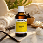 Huile végétale bio vanille Pranarom en flacon ambré avec gousses vanille fraîches