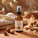 Huile de macadamia bio Florame avec noix et éléments naturels sur surface terracotta