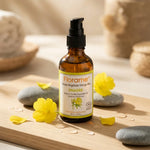 Huile Végétale d'Onagre bio Florame en flacon avec fleurs d'onagre fraîches et pierres