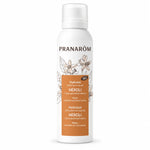 Hydrolat bio neroli Pranarom en flacon spray avec fleurs blanches et produits de soin

