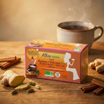 Boîte Tchaï bio Ayurvana avec épices, gingembre frais, cannelle et tasse fumante
