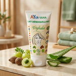 Lait démaquillant Triphala bio Ayurvana sur vanité marbre avec baies et aloe vera