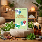 Livre Initiation à l'Ayurveda de J.-M. Réa sur coussin méditation avec herbes et huiles essentielles
