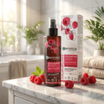 Lotion démêlante Centifolia bio spray sur lavabo avec framboises et gouttes d'eau