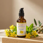 Macérat huileux de Millepertuis bio Florame avec fleurs jaunes et feuilles vertes sur bois