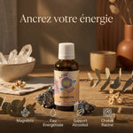 Elixir de cristal Magnétite avec minéraux bruts et botaniques sur bois naturel