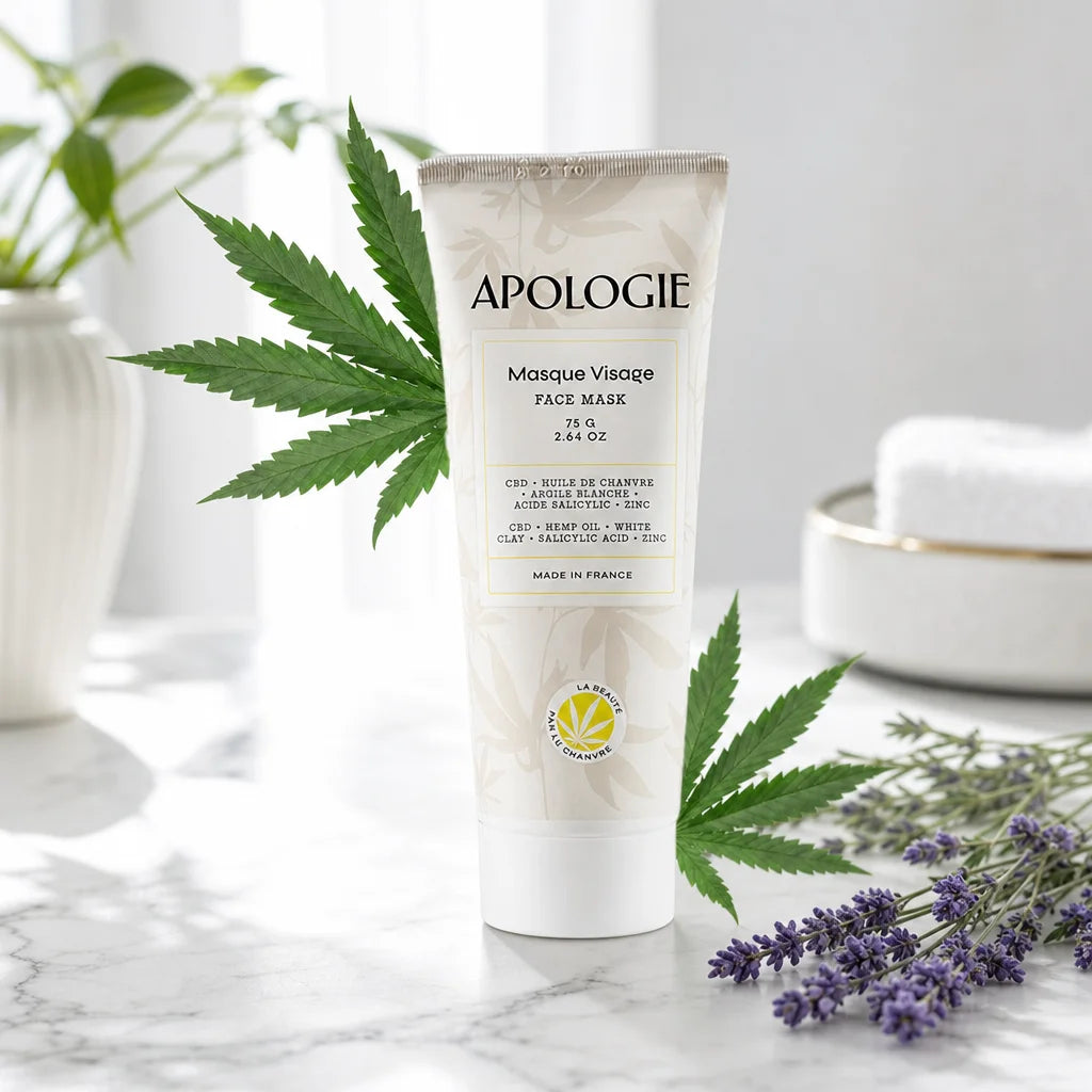 Masque Visage Purifiant Apologie 75g tube sur marbre blanc avec feuilles de chanvre et lavande