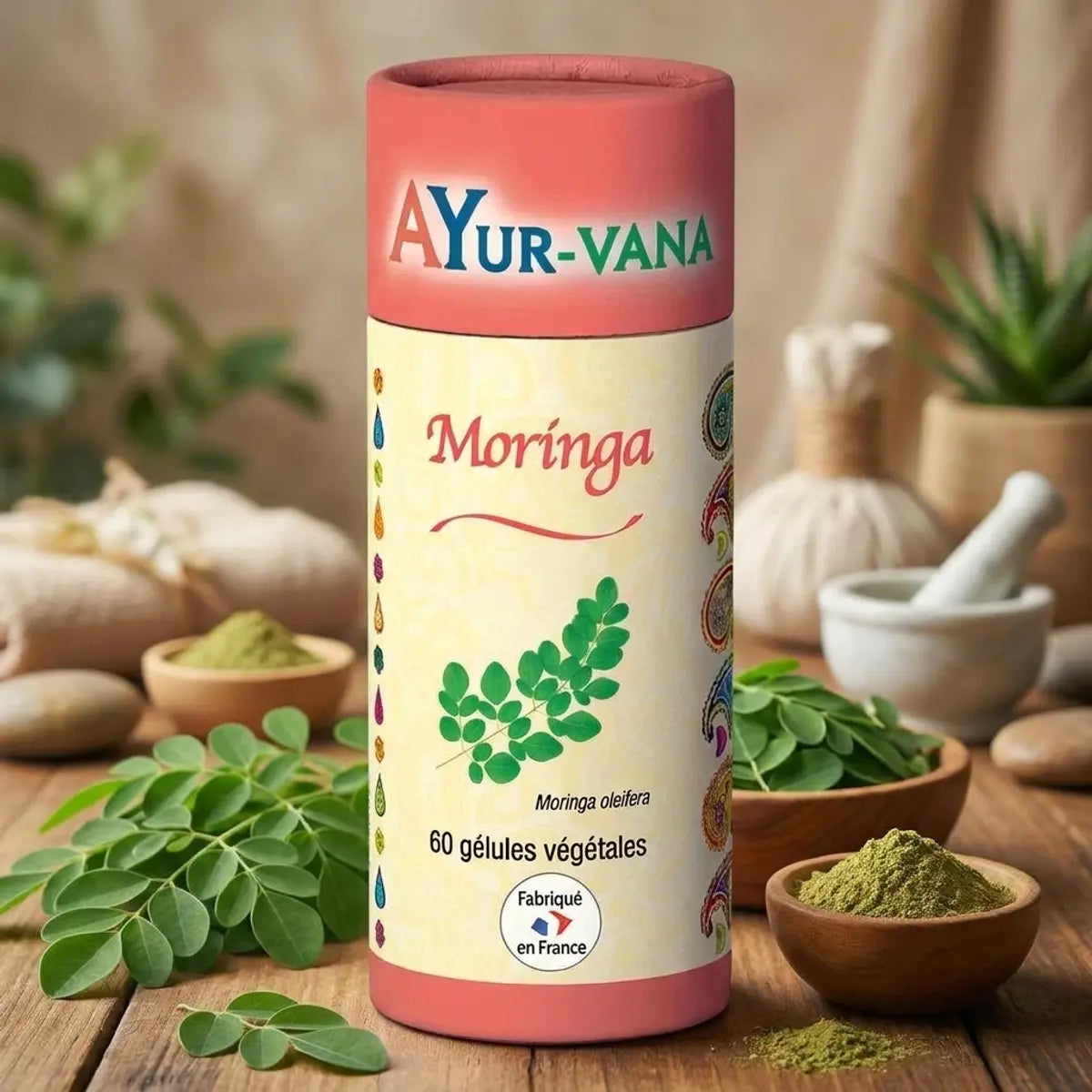 Bouteille Moringa Ayur-vana gélules vegan avec feuilles fraîches et ambiance bien-être ayurvédique