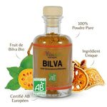 Poudre de fruits de Bilva Bio Ayurvana avec bouteille, fruit frais et certification AB européenne