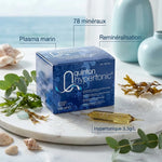 Boîte Quinton Hypertonic 30 ampoules avec ingrédients marins naturels sur marbre blanc