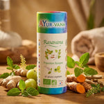 Rasavana Bio vegan en gélules Ayurvana entourée d'herbes naturelles et plantes adaptogènes