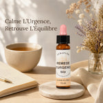 Remède d'Urgence Bio en compte-gouttes Auraflor sur bureau minimaliste avec fleurs séchées et thé