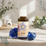 Bouteille de Saphir élixir de cristal Ansil avec pierres de lapis-lazuli dans ambiance wellness spa