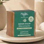 Savon d'Alep 12% HBL Najel 200g barre marron sur meuble salle de bain