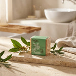 Savon d'Alep Najel 12% HBL sur pierre naturelle avec feuilles de laurier et olive