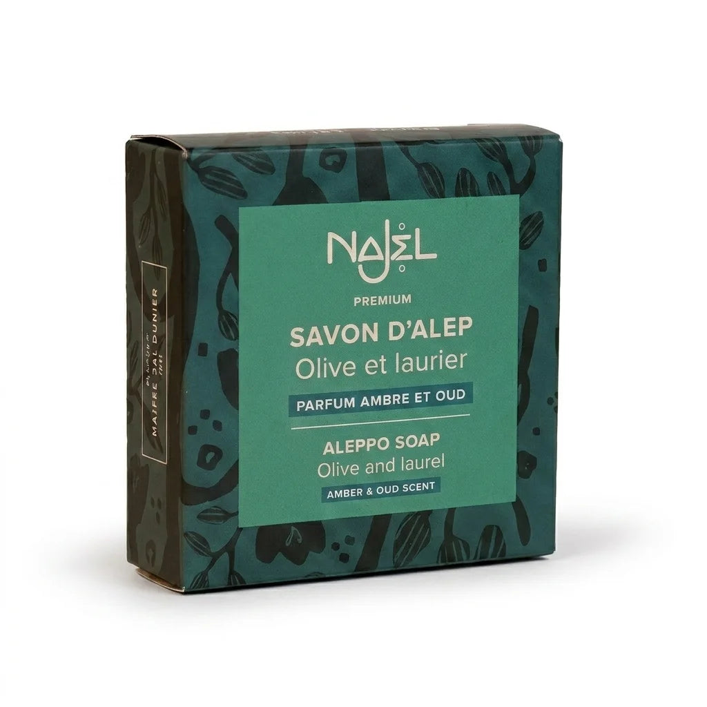Savon d'Alep Najel ambre et oud dans son emballage teal-green sur fond blanc