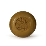 Savon d'Alep au jasmin bio Najel rond brun sur fond blanc