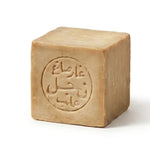 Savon d'Alep détachant Najel, barre cubique beige avec logo arabe