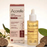 Sérum Anti-repousse Bio Acorelle en flacon avec pipette sur surface marbre