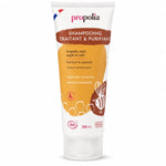 Shampooing traitant bio Propolia à la propolis, miel et argile sur fond blanc